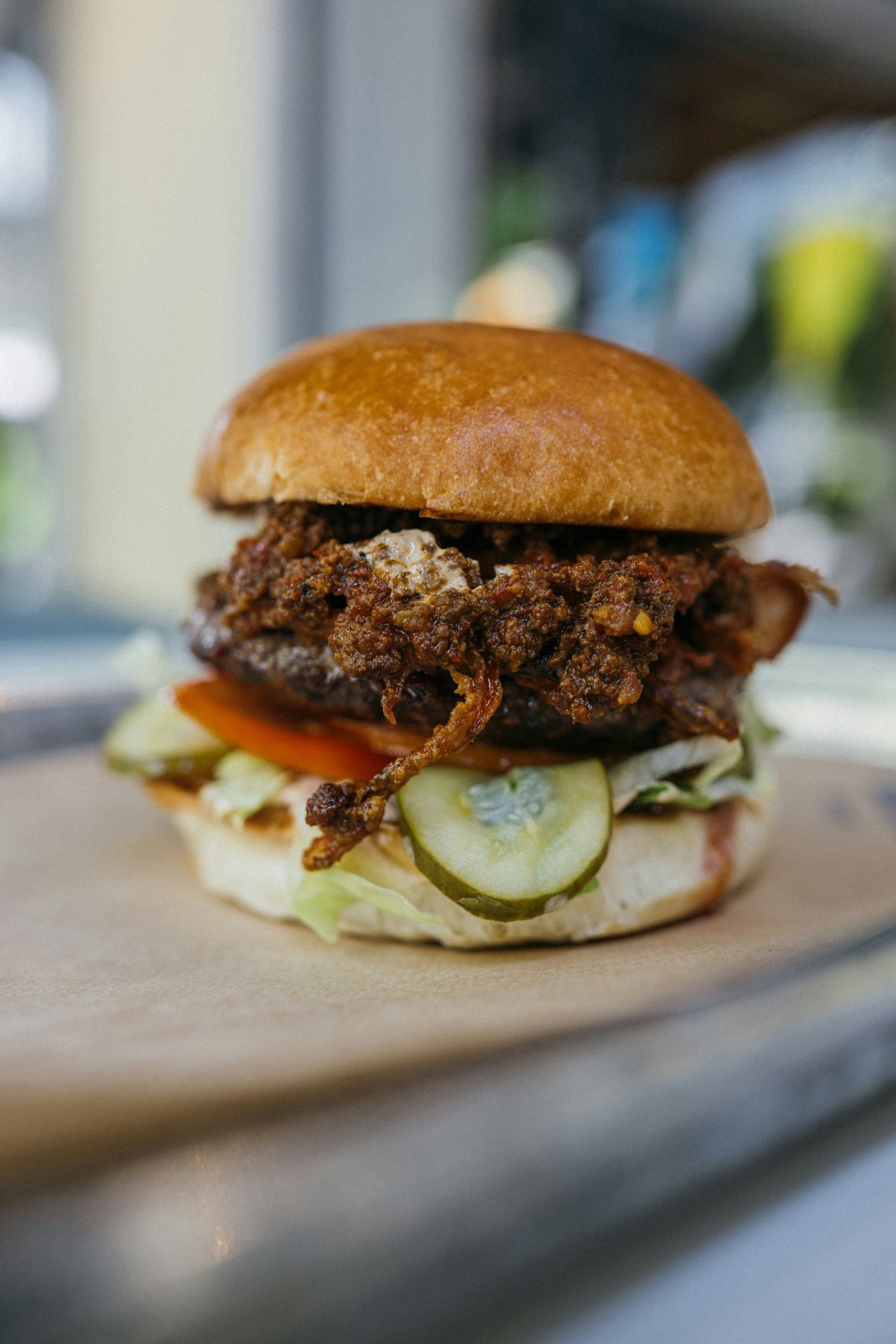 Sandwich with a saucy topping