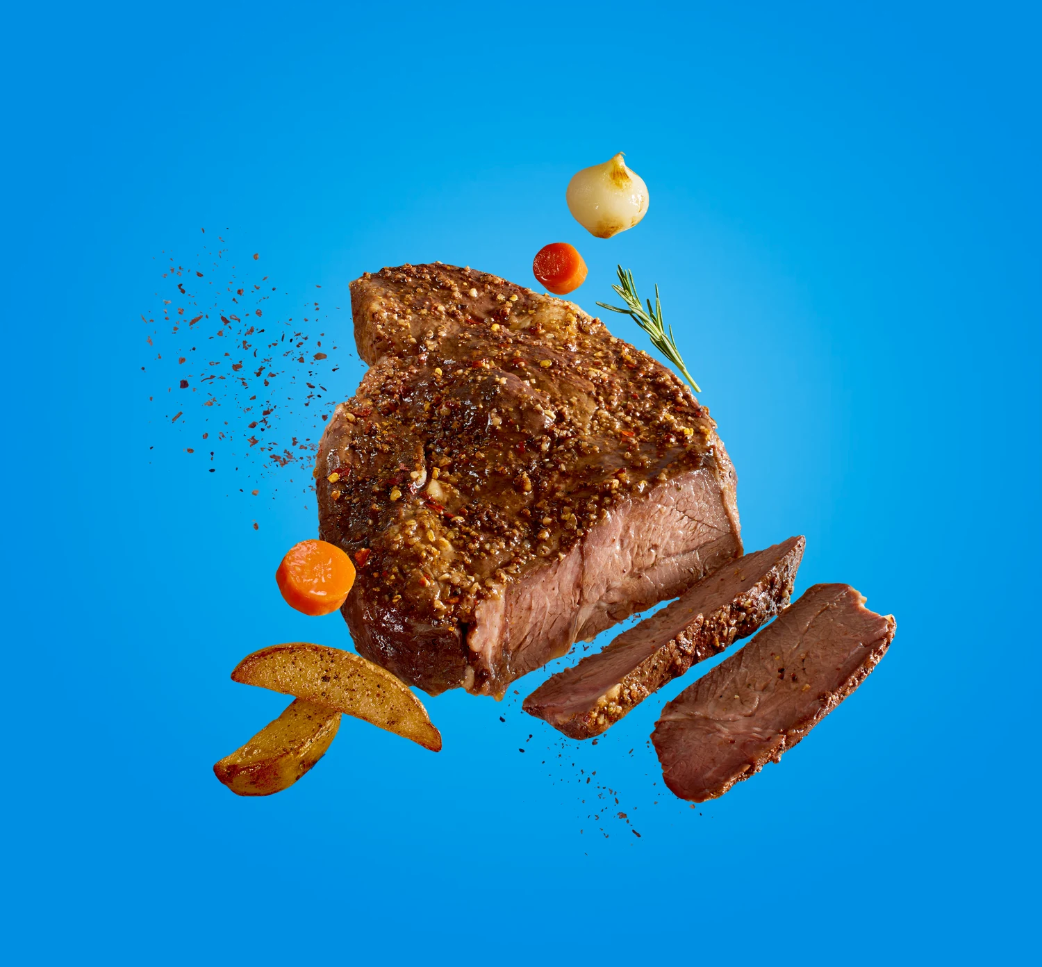 Kroger campaign: a floating roast with slices, carrots, an onion and potato wedges on blue
