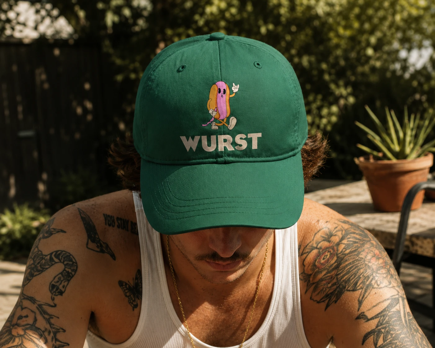Green Wurst cap with the hot dog mascot