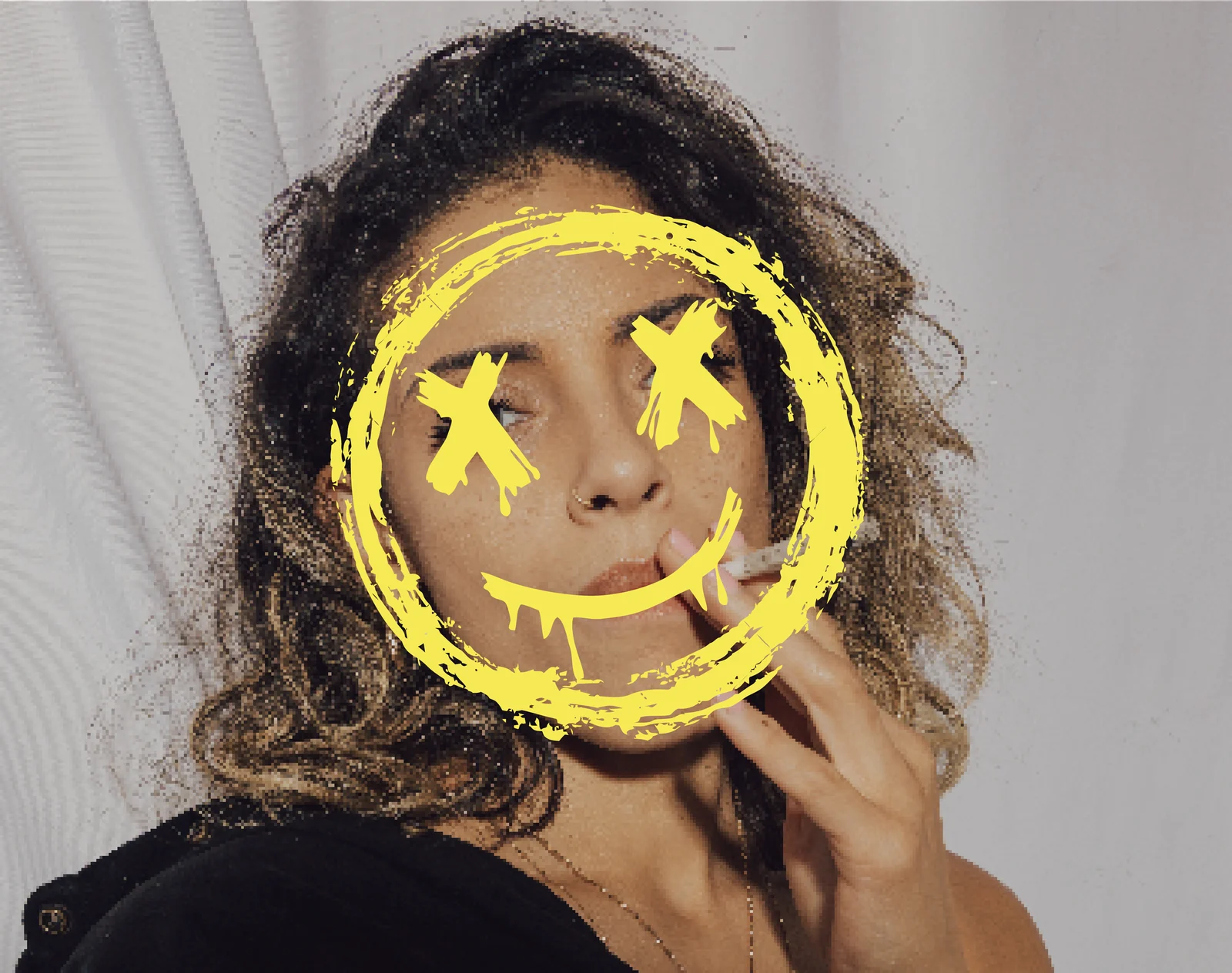 Portrait with a hand-drawn yellow smiley face over it